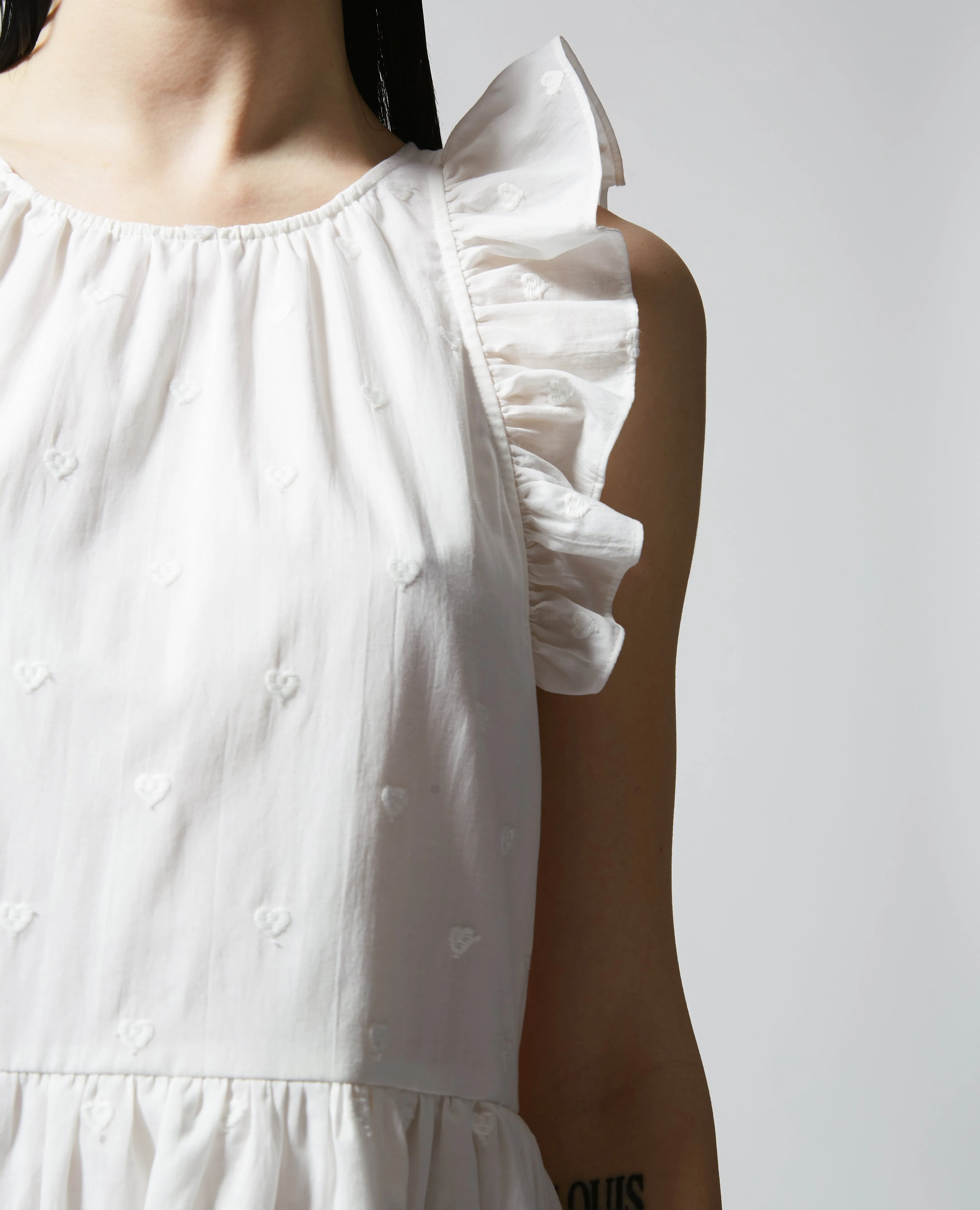 Robe courte écrue sans manches brodée